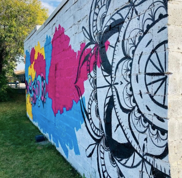 Photo of a colorful exterior mural on a salon in Minnedosa MB.